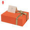 FSC UV Coating กล่องกระดาษแข็งสีส้มของขวัญกล่องบรรจุภัณฑ์แข็งพร้อมริบบิ้น
